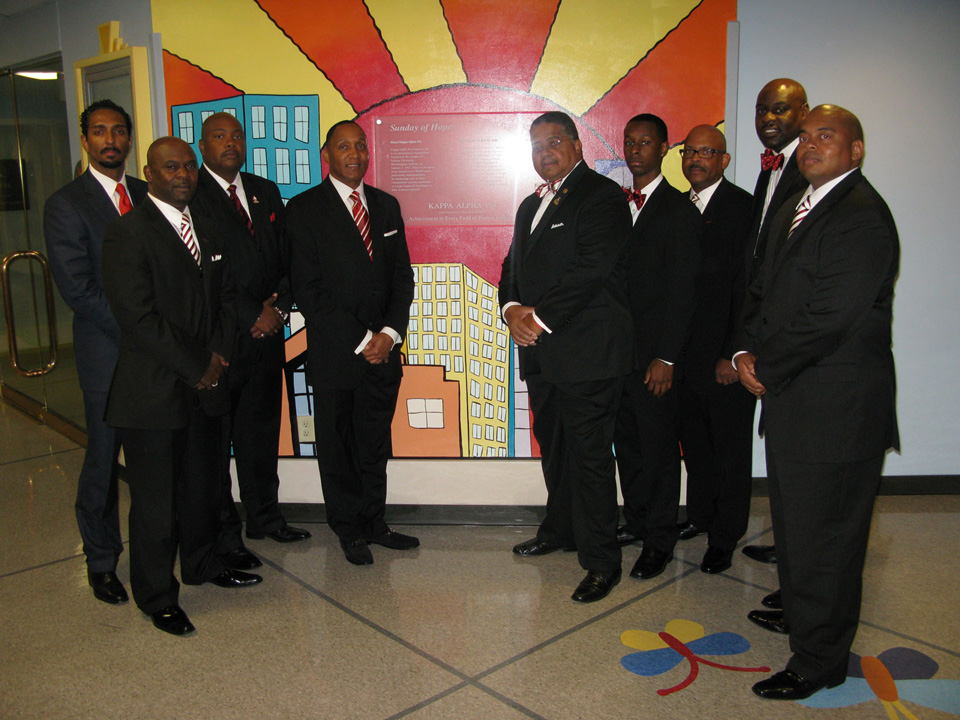 Members of Kappa Alpha Psi presents one million dollar check to St. Jude